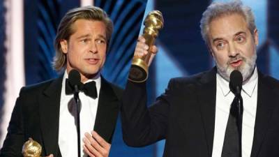 Sam Mendes (d) se llevó el Globo de Oro a mejor película por '1917', mientras que Brad Pitt (i) ganó a mejor actor de reparto por 'Once Upon a Time in Hollywood.'