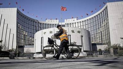 Sede del Banco Popular de China, en Beijing. Ante las presiones políticas, la entidad abandonó su intento para que el mercado tuviera una mayor influencia en el yuan.