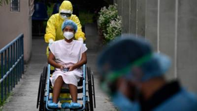 La cifra de fallecidos se mantiene en 10, los pacientes recuperados llegaron a 125 y los casos 'activos' suman 289. Foto: AFP