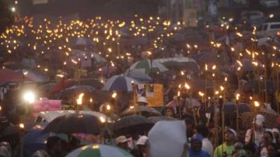 La lluvia no impidió que los indignados marcharan el viernes en Tegucigalpa.