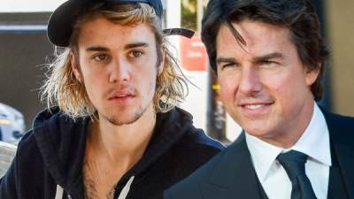Justin Bieber desafió al actor Tom Cruise (d) a unirse al reto viral #BottleCapChallenge.