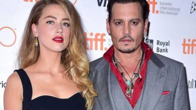 Los exesposos Amber Heard y Johnny Depp en una foto de archivo.
