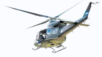 Un helicóptero de la Fuerza Aérea de Honduras en un vuelo durante un acto oficial.