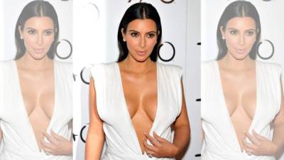 Kim Kardashian no duda en utilizar escotes en V en la mayoría de sus trajes.