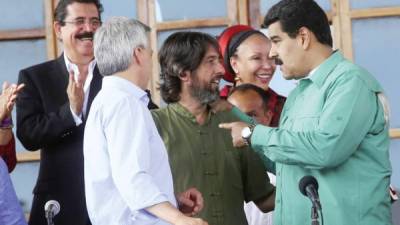 Alfredo Serrano, de 40 años, se ha convertido en un asesor económico clave de Maduro. En una foto de 2014 con el presidente.