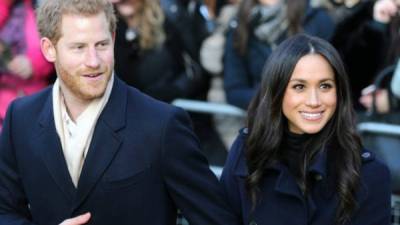 El príncipe Harry y su futura esposa Meghan Markle.