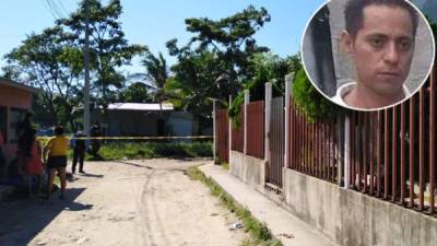 Vecinos de la colonia Valle de Sula observando la escena donde quedó tirado el hombre.