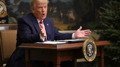 El presidente de los Estados Unidos, Donald Trump, participa en una teleconferencia de Acción de Gracias con miembros del Ejército de los Estados Unidos, en la Casa Blanca. Foto AFP