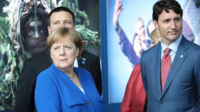 La canciller alemana, Angela Merkel y el primer ministro de Canadá, Justin Trudeau. AFP