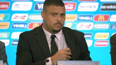 Ronaldo Nazario, member of Local Organising Committee (COL) gesture during a press conference, at the Mario Filho 'Maracana' stadiun in Rio de Janeiro, Brazil, on March 27, 2014, during Local Organising Committee (COL) board meeting media briefing AFP PHOTO /VANDERLEI ALMEIDA