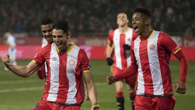 'Choco' Lozano corre junto a Juanpe celebrando el tercer gol del Girona FC contra el Leganés.