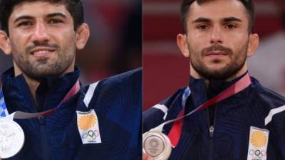 Los dos atletas georgianos han sido expulsados de la Villa Olímpica. Fotos AFP.