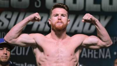 El mexicano SaÃºl 'Canelo' Ãlvarez camina a su esquina tras noquear al ruso Sergey Kovalev en una pelea por el cetro de los semipesados por la OrganizaciÃ³n Mundial de Boxeo, el sÃ¡bado 2 de noviembre de 2019 (AP Foto/John Locher)