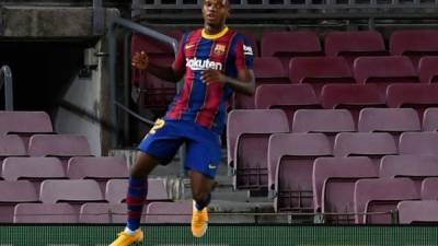 Barcelona's Spanish forward Ansu Fati celebrates after scoring a second goal during the Spanish league football match FC Barcelona against Villarreal CF at the Camp Nou stadium in Barcelona on September 27, 2020. (Photo by Josep LAGO / AFP)