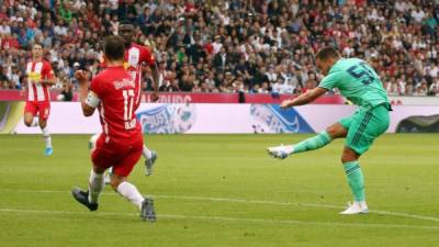 Real Madrid's forward Eden Hazard scores during the pre-Season friendly football match FC Red Bull Salzburg v Real Madrid in Salzburg, Austria on August 7, 2019. (Photo by KRUGFOTO / APA / AFP) / Austria OUT