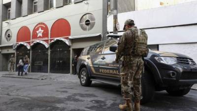 La sede del Partido de los Trabajadores al ser allanada. AFP