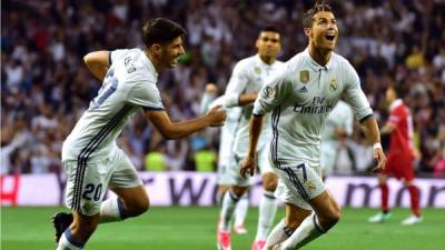 Cristiano Ronaldo celebrando su segundo gol contra el Sevilla. Foto AFP