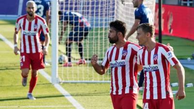 El Atlético se consolidó en el tercer lugar con la victoria en campo del Levante. Foto AFP.