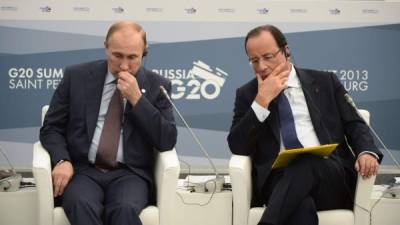 El presidente ruso Vladimir Putin y el francés François Hollande. Fotos: AFP