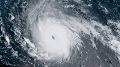 This image obtained from the National Oceanic and Atmospheric Administration shows Hurricane Irma on September 5, 2017, at 1215UTC.Irma picked up strength and has become an 'extremely dangerous' Category Five hurricane as it approached the Caribbean, the Miami-based National Hurricane Center reported. Irma is about 270 miles (440kms) east of the island of Antigua packing maximum sustained winds of 175mph (280kph). / AFP PHOTO / NOAA/RAMMB / Jose ROMERO / RESTRICTED TO EDITORIAL USE - MANDATORY CREDIT 'AFP PHOTO / NOAA/RAMMB' - NO MARKETING NO ADVERTISING CAMPAIGNS - DISTRIBUTED AS A SERVICE TO CLIENTS