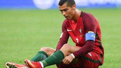 Portugal's forward Cristiano Ronaldo looks on during the Russia 2018 World Cup Group B football match between Portugal and Spain at the Fisht Stadium in Sochi on June 15, 2018. / AFP PHOTO / PIERRE-PHILIPPE MARCOU / RESTRICTED TO EDITORIAL USE - NO MOBILE PUSH ALERTS/DOWNLOADS