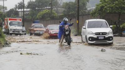 <b>Lluvias provocan inundaciones en la zona urbana de San Pedro Sula en 2023. Fotos: Franklyn Muñóz</b>