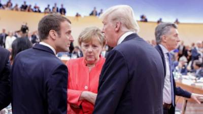 El presidente de Francia Emmanuel Macron, la canciller alemana Ángela Merkel y el presidente de EEUU, Donald Trump. Foto: AFP/Archivo