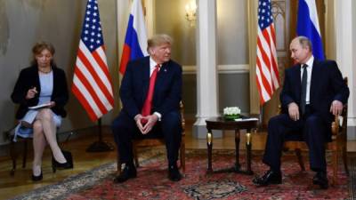 Los presidentes Donald Trump y Vladmir Putin.