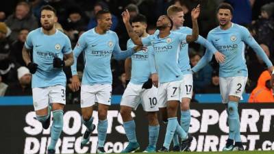 Los jugadores del Manchester City celebrando el gol de Raheem Sterling ante Newcastle.