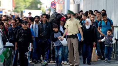 Miles de refugiados ya han llegado a la capital bávara, se esperan miles más.