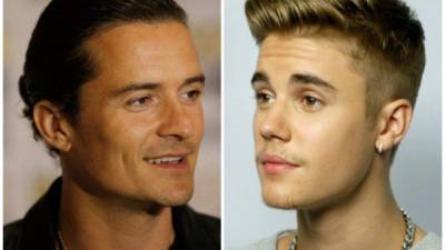 El actor Orlando Bloom y el cantante Justin Bieber.