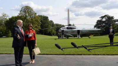 El presidente de Estados Unidos, Donald Trump y la primera dama, Melania. Foto: AFP