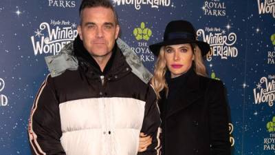 Robbie Williams y su esposa Ayda Field. Foto: Agencias.