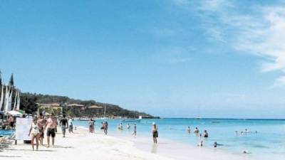 Las playas de Roatán son las favoritas de turistas nacionales y extranjeros.