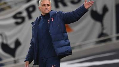 Tottenham Hotspur's Portuguese head coach Jose Mourinho gestures during the English League Cup fourth round football match between Tottenham Hotspur and Chelsea at Tottenham Hotspur Stadium in London, on September 29, 2020. (Photo by NEIL HALL / AFP) / RESTRICTED TO EDITORIAL USE. No use with unauthorized audio, video, data, fixture lists, club/league logos or 'live' services. Online in-match use limited to 120 images. An additional 40 images may be used in extra time. No video emulation. Social media in-match use limited to 120 images. An additional 40 images may be used in extra time. No use in betting publications, games or single club/league/player publications. /