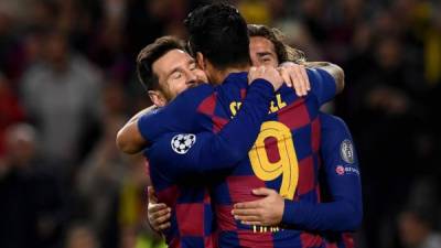 Messi, Suárez y Griezmann lideraron la victoria del Barcelona contra el Borussia Dortmund. Foto AFP