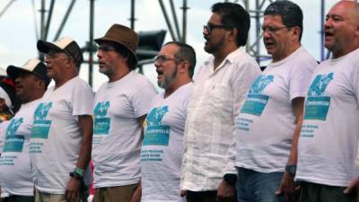 El líder de las FARC Timoleón Jiménez y miembros del secretariado en un acto el pasado 23 de septiembre. EFE