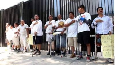 El grupo de hondureños mutilados por 'La Bestia' que obtuvieron asilo político en Estados Unidos.