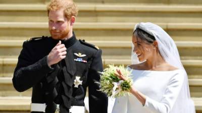 El príncipe Harry con Meghan Markle. AFP