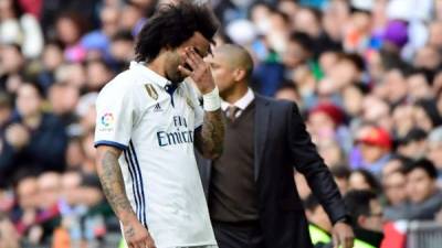 Marcelo se retiró del campo lesionado contra el Málaga. Foto AFP