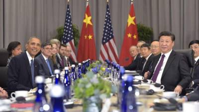 El presidente estadounidense Barack Obama junto al mandatario chino, Xi Jinping.