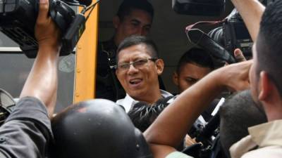 El exoficial Jorge Alberto Barralaga Hernández a su llegada a los tribunales de Tegucigalpa / AFP PHOTO / ORLANDO SIERRA.