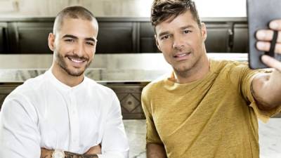 Maluma y Ricky Martin en una escena del video 'Vente pa' ca'. Foto: Billboard.