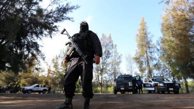 El enfrentamiento entre policías y presuntos narcotraficantes saldó con la muerte de 43 personas en Tanhuato.