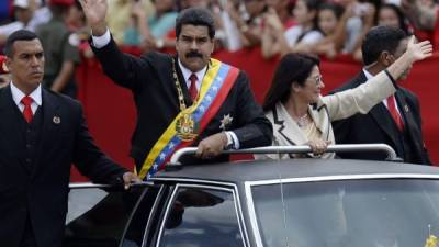 El presidente venezolano junto a su esposa, Cilia Flores.