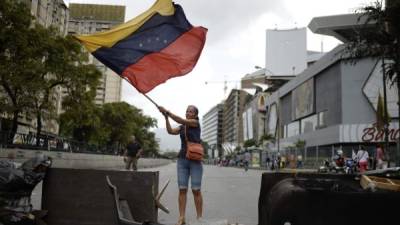 Según la MUD, con la consulta iniciará la fase decisiva para sacar del poder a Maduro, acosado por protestas que dejan 95 muertos.