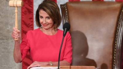 New Speaker of the US House of Representatives Nancy Pelosi, D-CA, holds the gavel during the opening session of the 116th Congress at the US Capitol in Washington, DC, January 3, 2019. (Photo by SAUL LOEB / AFP)