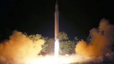 This July 28, 2017 picture released from North Korea's official Korean Central News Agency (KCNA) on July 29, 2017 shows North Korea's intercontinental ballistic missile (ICBM), Hwasong-14 being lauched at an undisclosed place in North Korea.Kim Jong-Un boasted of North Korea's ability to strike any target in the US after a second ICBM test that weapons experts said could even bring New York into range - in a potent challenge to US President Donald Trump. / AFP PHOTO / KCNA VIS KNS / STR / South Korea OUT / REPUBLIC OF KOREA OUT ---EDITORS NOTE--- RESTRICTED TO EDITORIAL USE - MANDATORY CREDIT 'AFP PHOTO/KCNA VIA KNS' - NO MARKETING NO ADVERTISING CAMPAIGNS - DISTRIBUTED AS A SERVICE TO CLIENTSTHIS PICTURE WAS MADE AVAILABLE BY A THIRD PARTY. AFP CAN NOT INDEPENDENTLY VERIFY THE AUTHENTICITY, LOCATION, DATE AND CONTENT OF THIS IMAGE. THIS PHOTO IS DISTRIBUTED EXACTLY AS RECEIVED BY AFP. TO GO WITH NKorea-nucelar-missile-Japan-SKorea-politics, FOCUS by Shingo Ito and Park Chan-Kyong /