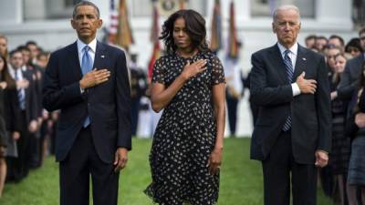 Barack Obama, su mujer Michelle y el vicepresidente Joe Biden rinden tributo a las victimas del 11S.