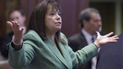 Illinois Sen. Iris Y. Martinez, D-Chicago, argues the issue of illegal immigrants drivers licenses legislation on the Senate floor during veto session at the Illinois State Capitol Tuesday, Dec. 4, 2012, in Springfield Ill. (AP Photo/Seth Perlman)